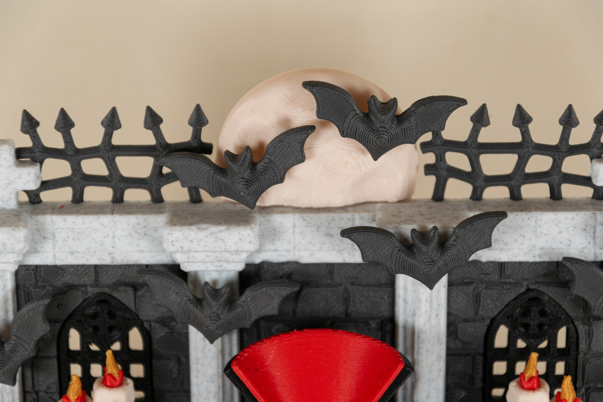 Détail de la lune, des grilles et des chauves-souris du Repaire de Dracula MinoZoo.